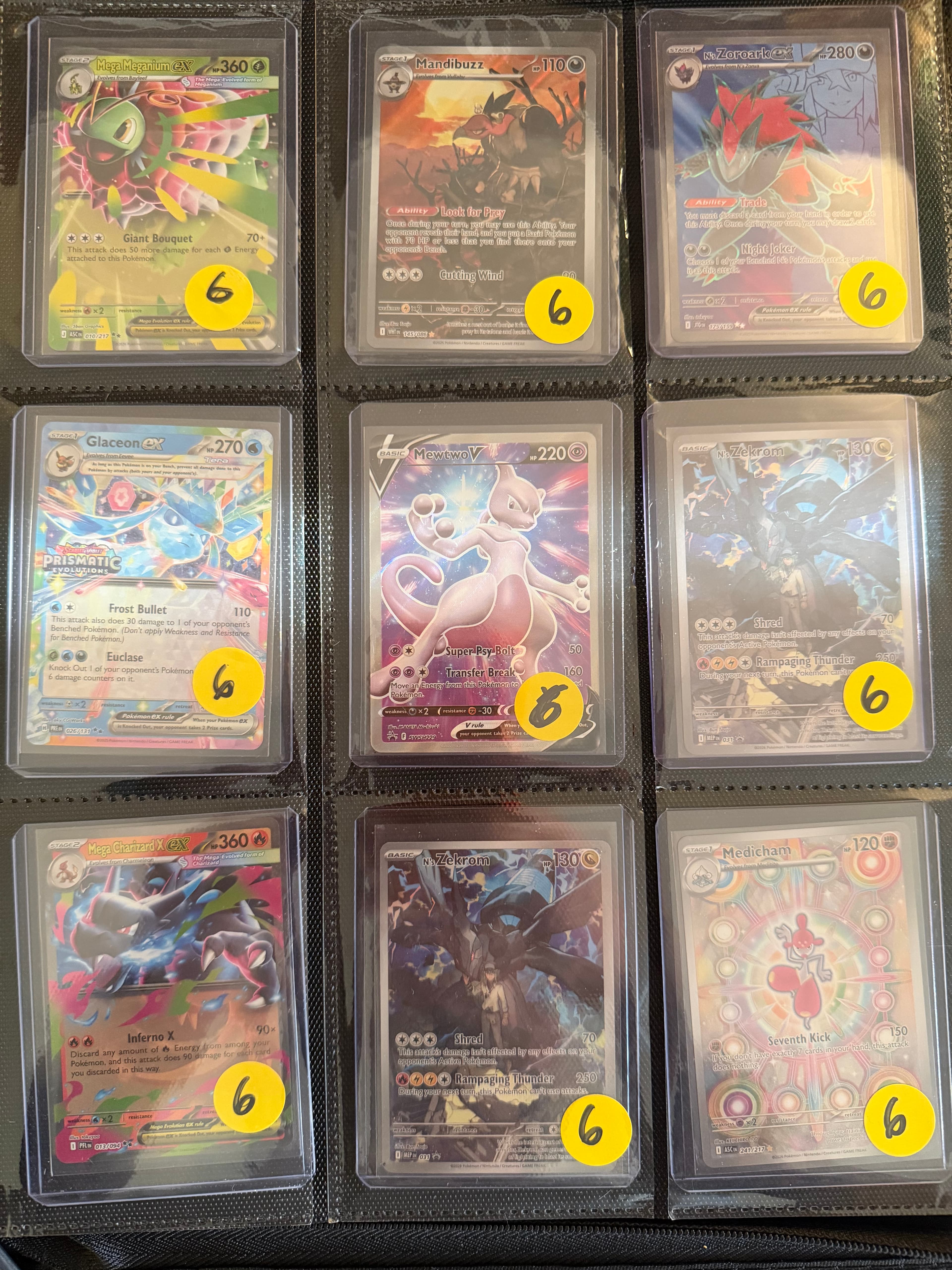 A grid of nine Pokémon cards in sleeves, each with a yellow number six sticker.